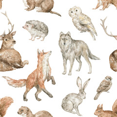 Watercolor seamless pattern with wild forest animals. Deer, fox, wolf, hare, squirrel, owl, birds, hedgehog, weasel. Woodland wildlife. 