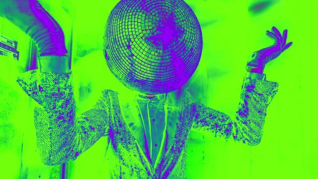 Mr disco ball dancing in a lift