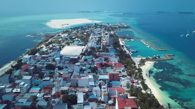 4K Footage Aerial View to the Maafushi Island local beach, Maldives