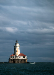 Fototapeta na wymiar dramatic sky in Chicago Harbor Light House.