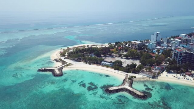 4K Footage Aerial View to the Maafushi Island local beach, Maldives
