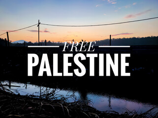 Text FREE PALESTINE with beautiful sunrise morning view with reflection on water background.