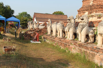 ruined brick buddhist temple (Wat Thammikarat) in ayutthaya (thailand) - obrazy, fototapety, plakaty