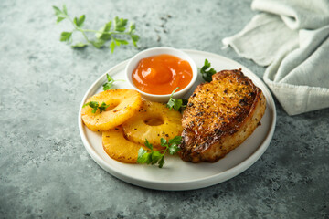 Grilled turkey with pineapple and mango sauce