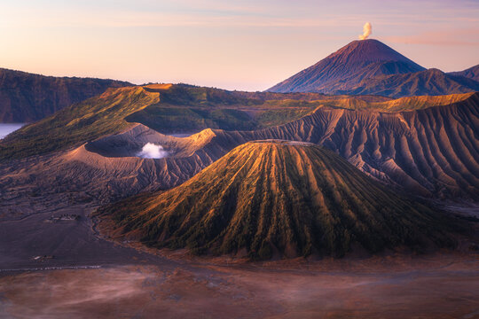 Mt.Semeru Mt.Bromo Mt.Batok , when the sunrise is lightly fog and the sky is beautiful. Smoke rising from the crater. , Indonesia Tengger Semeru national park.