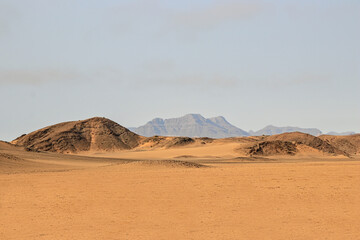 Fototapeta na wymiar stunning desert landscape with distant mountains, Namibia