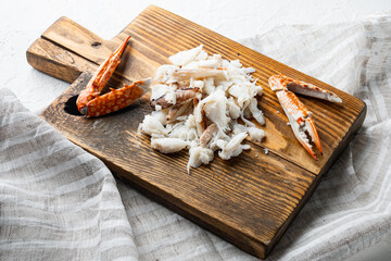 Boiled Blue swimmer crab meat or Horse Blue crab, Flower crab, on wooden cutting board, on white background - obrazy, fototapety, plakaty