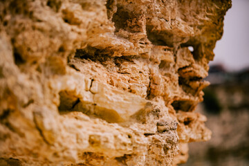 Copper mineralised rock pile, rubble tailings, close with shallow depth of field 