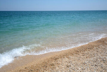 The crystalline waters of the Mediterranean sea in Sicily with intense turquoise and yellows...
