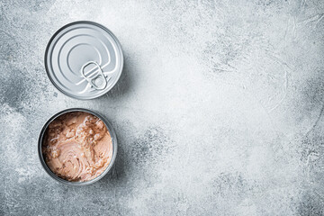 Canned soy free albacore white meat tuna, in tin can, on gray background, top view flat lay, with copyspace  and space for text
