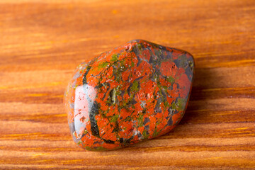 Unakite is an altered granite composed of pink orthoclase feldspar, green epidote, and generally colorless quartz