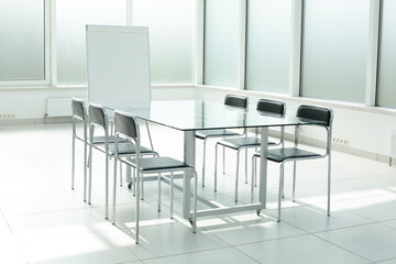 Learning flipchart glass table chairs in office space
