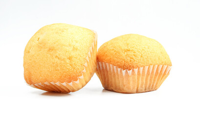 Two yellow muffin sweets isolated on white background