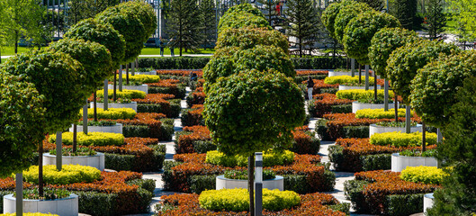 View from observation deck to French Garden. Great design of park. Public city landscape park "Krasnodar" or Galitsky park. Sunny spring day. Late spring. Krasnodar, Russia - 05 May 2021