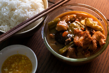Braised pork with bitter gourd Chinese food with steamed rice