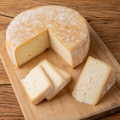 Artisanal Canastra cheese from Minas Gerais, Brazil over wooden board