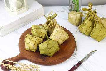 Ketupat Lebaran, Indonesian Rice Cake made from coconut leaves filling with rice boiled for few...