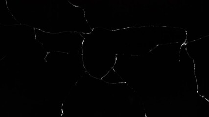 Glass Brake. Background or Overlay. Sound Included. This is real glass, shot on camera. No vfx. Real sound included. To add it above your video, photo or animation, use "screen" mode for this file in 