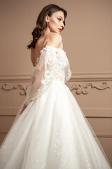 Fototapeta premium Beautiful smiling blonde bride in wedding dress