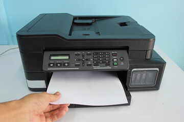 Employees are Photocopying in office