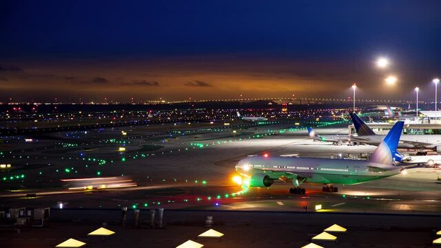 Generic Unmarked International Airport Airfield Night Timelapse with Moving Lights from Commercial Jet Airliners