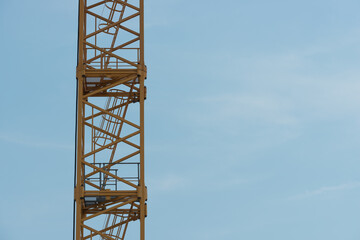 Fototapeta na wymiar construction crane against blue sky