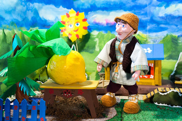 Home puppet theatre. Oldman and turnip.