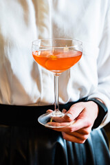 mocktail in the woman's hands