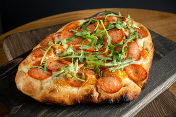 italian pizza on the wooden table