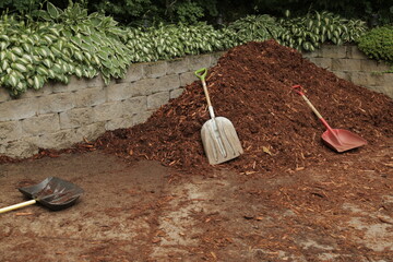 shovels in the mulch