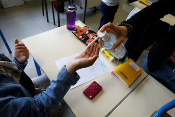 Primary school in Montrouge after lockdown, France. Hand sanitizer.
