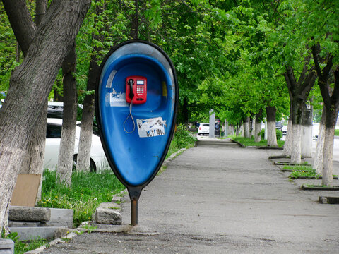 Street Toll Red Payphone On Blue Wall