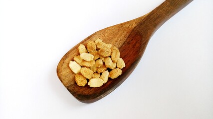 Bitter Gourd Seeds in wooden spoon