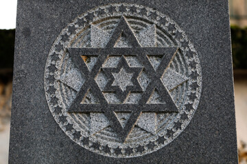 City of Paris cemetery, Bagneux, Hauts-de-Seine, France. Star of David relief on a jewish grave