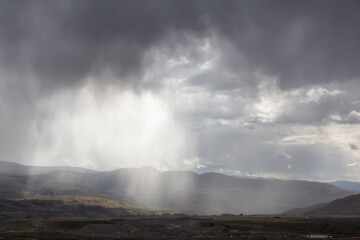 View of Desert Mountain Canadian Nature Landscape. Stormy and Rainy Weather. Taken in Savona near Kamloops, British Columbia, Canada. Background