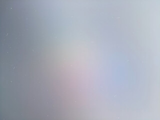 soft, blurry iridescent highlights creating a gradient