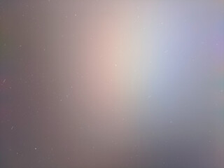 soft, blurry iridescent highlights creating a gradient