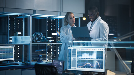 Modern Electronics Research, Development Facility: Engineer and Scientist Standing In High-Tech...