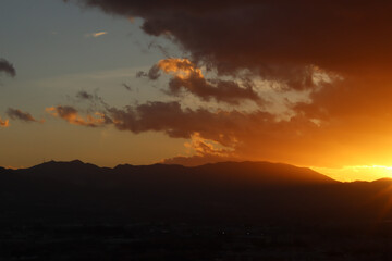 Fototapeta na wymiar sunset over the mountains