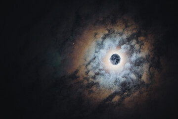 Fototapeta na wymiar Full Moon with Mars among clouds