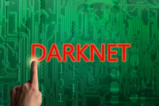 Man using hacking darknet. Data thief, internet fraud, dark web and cyber security concept.