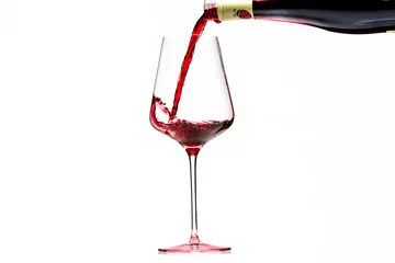 Fotobehang ワイングラスにワインを注ぐ © ドンピエロ