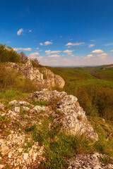 Rocky mountain top  and cloudy blue sky