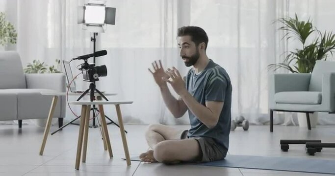 Professional personal trainer recording a video