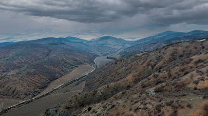 Naklejka premium Coast of the Crimea peninsula, rocky mountains, aerial view of the Novy Svet sea resort, mountain serpentine