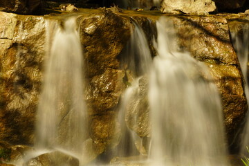 Water rushes down a waterfall.