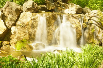 Water rushes down a waterfall.