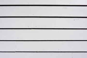 Neat and tidy wood siding on the exterior of a shed