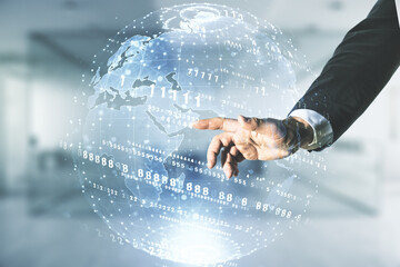 Multi exposure of programmer's hand clicks on abstract graphic coding sketch and world map on blurred office background, big data and networking concept