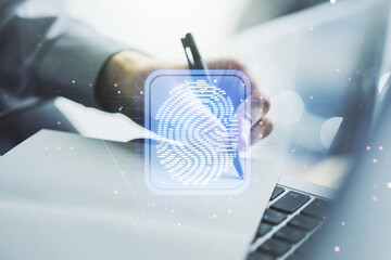 Abstract creative fingerprint illustration with hand writing in diary on background with laptop, personal biometric data concept. Multiexposure
